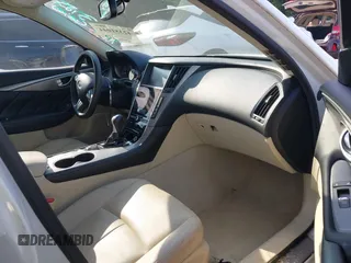 2015 Infiniti Q50 Premium z VIN JN1BV7AP5FM333958, wystawiony jako IAAI lot #42351044 z przebiegiem 158 428 mil mil oraz . Historia ofert i sprzedaży dostępna na DreamBid. Obrazek 5.