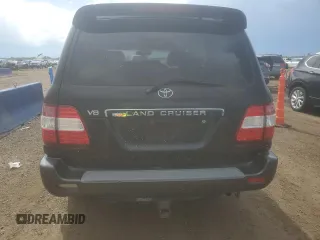 2006 Toyota Land Cruiser z VIN JTEHT05J262085007, wystawiony jako Copart lot #59312615 z przebiegiem 311 264 mil mil oraz Czysty tytuł • Clean title. Historia ofert i sprzedaży dostępna na DreamBid. Obrazek 6.