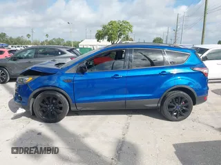 2018 Ford Escape SE z VIN 1FMCU0GD2JUC27271, wystawiony jako IAAI lot #41947047 z przebiegiem 154 672 mil mil oraz . Historia ofert i sprzedaży dostępna na DreamBid. Obrazek 14.