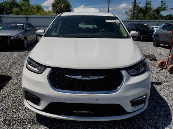 2023 Chrysler Pacifica Hybrid Touring L z VIN 2C4RC1L74PR558768, wystawiony jako Copart lot #61407555 z przebiegiem 70 387 mil mil oraz Czysty tytuł • Clean title. Historia ofert i sprzedaży dostępna na DreamBid. Obrazek 5.