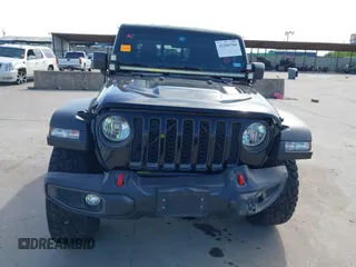 2021 Jeep Gladiator Rubicon z VIN 1C6JJTBG6ML535939, wystawiony jako IAAI lot #42260764 z przebiegiem 114 060 mil mil oraz . Historia ofert i sprzedaży dostępna na DreamBid. Obrazek 12.