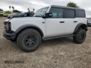 2024 Ford Bronco Wildtrak z VIN 1FMEE2BP9RLA07694, wystawiony jako Copart lot #51856335 z przebiegiem 21 102 mil mil oraz Szkody całkowita. Historia ofert i sprzedaży dostępna na DreamBid. Obrazek 1.