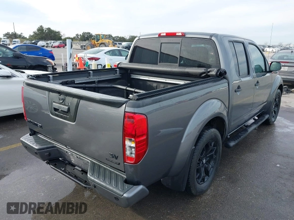 2021 Nissan Frontier SV with VIN 1N6ED0EA6MN722476, listed as a IAAI auction lot 41284313 with 22,476 mi miles and . Bid and sale history available at DreamBid. Image 4.