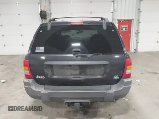 1999 Jeep Grand Cherokee Laredo with VIN 1J4GW58SXXC649579, listed as a IAAI auction lot 42365959 with 199,742 mi miles and . Bid and sale history available at DreamBid. Image 16.