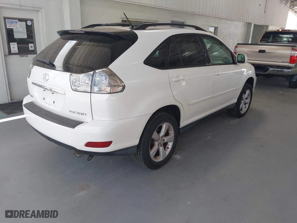 2006 Lexus RX 330 with VIN 2T2HA31U76C105888, listed as a IAAI auction lot 42125780 with 207,299 mi miles. Bid and sale history available at carsss.com. Image 4.