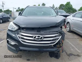 2017 Hyundai Santa Fe 2.4L with VIN 5NMZUDLB0HH037142, listed as a IAAI auction lot 42323880 with 87,396 mi miles and . Bid and sale history available at DreamBid. Image 6.