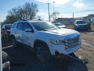 2020 GMC Acadia SLT with VIN 1GKKNMLS4LZ136098, listed as a IAAI auction lot 41618272 with 100,486 mi miles and . Bid and sale history available at DreamBid. Image 13.