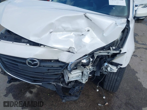 2014 Mazda 3 i Touring with VIN JM1BM1V78E1156409, listed as a IAAI auction lot 42039966 with 123,601 mi miles and . Bid and sale history available at DreamBid. Image 18.