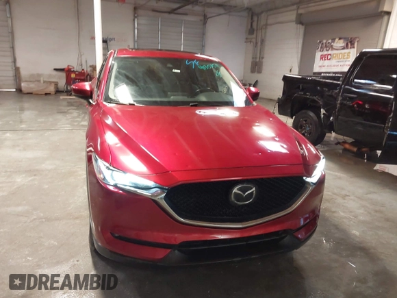 2020 Mazda CX-5 Grand Touring with VIN JM3KFBDM1L1809951, listed as a IAAI auction lot 41345854 with 117,376 mi miles. Bid and sale history available at carsss.com. Image 13.