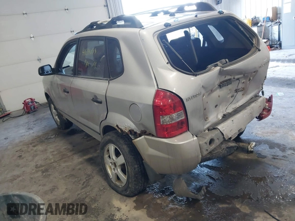 2005 Hyundai Tucson GL with VIN KM8JM12B25U171048, listed as a IAAI auction lot 41634099 with 188,086 mi miles. Bid and sale history available at carsss.com. Image 3.