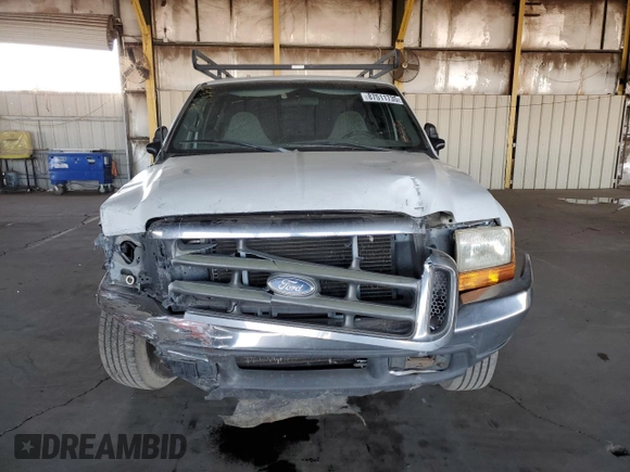 1999 Ford F-250 XL with VIN 1FTNX20FXXEE59499, listed as a Copart auction lot 87511735 with 215,520 mi miles and Salvage title. Bid and sale history available at DreamBid. Image 5.