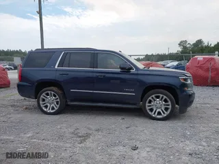 2019 Chevrolet Tahoe LT with VIN 1GNSCBKC7KR133119, listed as a IAAI auction lot 41570650 with 114,575 mi miles. Bid and sale history available at carsss.com. Image 13.