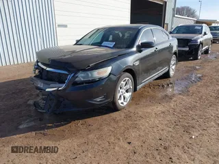 2011 Ford Taurus SEL with VIN 1FAHP2EW1BG177504, listed as a IAAI auction lot 41578564 with 243,855 mi miles. Bid and sale history available at carsss.com. Image 2.