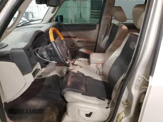 2007 Jeep Commander Overland z VIN 1J8HG68237C610869, wystawiony jako Copart lot #59824675 z przebiegiem 229 092 mil mil oraz Szkoda całkowita • Salvage title. Historia ofert i sprzedaży dostępna na DreamBid. Obrazek 7.