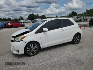 2014 Toyota Yaris L with VIN VNKJTUD37EA008192, listed as a Copart auction lot 70955594 with 129,486 mi miles and Salvage Title. Bid and sale history available at carsss.com. Image 1.