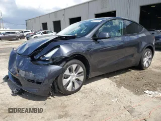 2024 Tesla Model Y Long Range with VIN 7SAYGDEE4RA251337, listed as a Copart auction lot 59844555 with 16,011 mi miles and Salvage title. Bid and sale history available at DreamBid. Image 1.