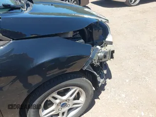 2019 Ford Fiesta SE z VIN 3FADP4EJ0KM125724, wystawiony jako IAAI lot #42320657 z przebiegiem 53 728 mil mil oraz . Historia ofert i sprzedaży dostępna na DreamBid. Obrazek 18.
