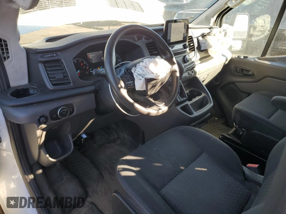 2020 Ford Transit Cargo with VIN 1FTBR2CG2LKB54267, listed as a Copart auction lot 77145744 with 75,702 mi miles and Salvage Title. Bid and sale history available at carsss.com. Image 8.