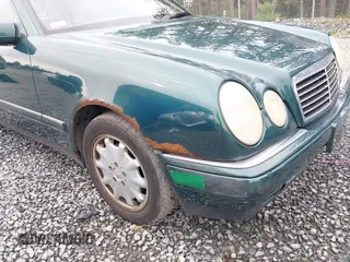 1998 Mercedes-Benz E-Class with VIN WDBJF65FXWA589630, listed as a IAAI auction lot 41990725 with 102,149 mi miles. Bid and sale history available at carsss.com. Image 6.