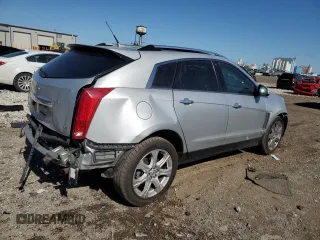 2013 Cadillac SRX Performance Collection with VIN 3GYFNDE31DS603053, listed as a Copart auction lot 57188725 with 234,360 mi miles and Salvage title. Bid and sale history available at DreamBid. Image 3.