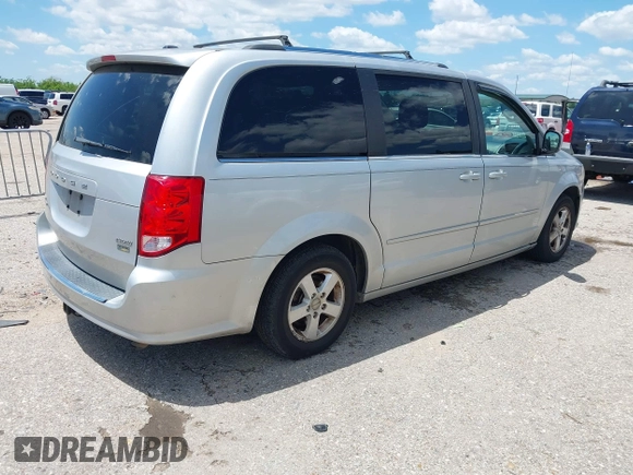 2011 Dodge Grand Caravan Crew with VIN 2D4RN5DG9BR660305, listed as a IAAI auction lot 42241401 with 176,079 mi miles and . Bid and sale history available at DreamBid. Image 4.