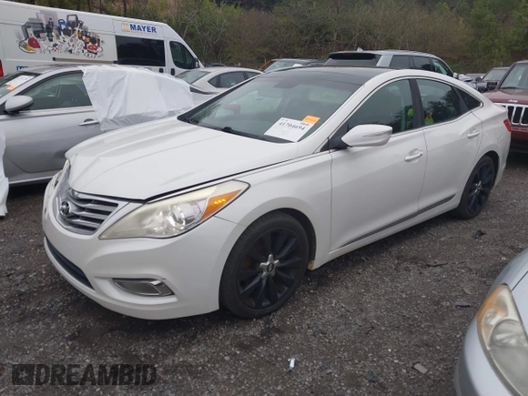 2013 Hyundai Azera with VIN KMHFH4JG0DA216691, listed as a IAAI auction lot 41704694 with 200,228 mi miles and . Bid and sale history available at DreamBid. Image 2.