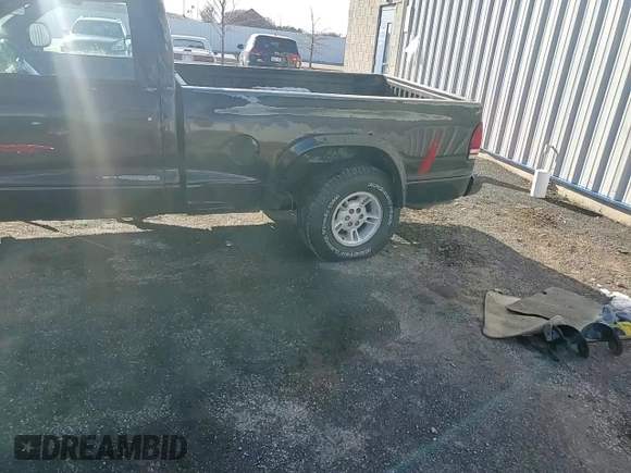 1997 Dodge Dakota z VIN 1B7GG26Y3VS174739, wystawiony jako Copart lot #49969395 z przebiegiem 226 942 mil mil oraz Nie do naprawy • Non repairable. Historia ofert i sprzedaży dostępna na DreamBid. Obrazek 11.
