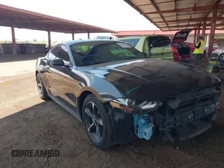 2022 Ford Mustang EcoBoost with VIN 1FA6P8TH9N5109501, listed as a IAAI auction lot 42437964 with 56,895 mi miles and . Bid and sale history available at DreamBid. Image 1.