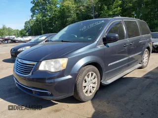 2014 Chrysler Town & Country Touring with VIN 2C4RC1BG2ER124461, listed as a IAAI auction lot 42181413 with 181,360 mi miles and . Bid and sale history available at DreamBid. Image 2.