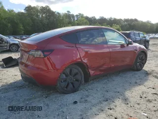 2024 Tesla Model Y Long Range with VIN 7SAYGDEE6RA318973, listed as a Copart auction lot 55586435 with 8,700 mi miles and Salvage title. Bid and sale history available at DreamBid. Image 3.