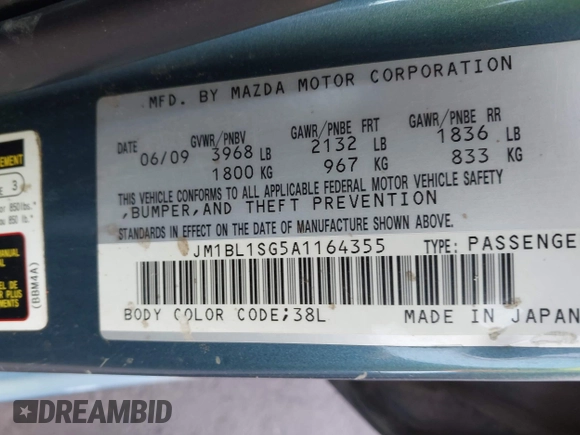 2010 Mazda Mazda3 i Touring with VIN JM1BL1SG5A1164355, listed as a IAAI auction lot 42044865 with 127,809 mi miles. Bid and sale history available at carsss.com. Image 9.