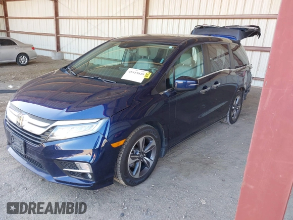 2020 Honda Odyssey Touring with VIN 5FNRL6H82LB015715, listed as a IAAI auction lot 41915849 with 69,603 mi miles and . Bid and sale history available at DreamBid. Image 18.