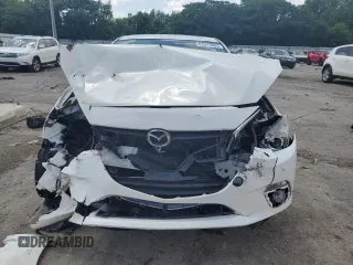 2015 Mazda 3 i Touring with VIN 3MZBM1L7XFM154245, listed as a Copart auction lot 61571995 with Not provided miles and Salvage title. Bid and sale history available at DreamBid. Image 5.