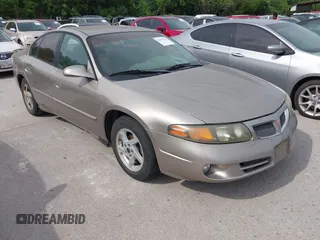 2004 Pontiac Bonneville SE z VIN 1G2HX52K04U248925, wystawiony jako IAAI lot #42072378 z przebiegiem 192 653 mil mil oraz . Historia ofert i sprzedaży dostępna na DreamBid. Obrazek 1.