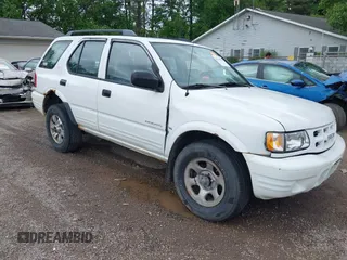 2000 Isuzu Rodeo z VIN 4S2DM58W6Y4312571, wystawiony jako IAAI lot #42253955 z przebiegiem 84 517 mil mil oraz . Historia ofert i sprzedaży dostępna na DreamBid. Obrazek 1.