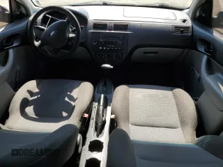 2007 Ford Focus S z VIN 1FAFP34N97W264411, wystawiony jako Copart lot #53251655 z przebiegiem 159 516 mil mil oraz Szkody całkowita. Historia ofert i sprzedaży dostępna na DreamBid. Obrazek 8.