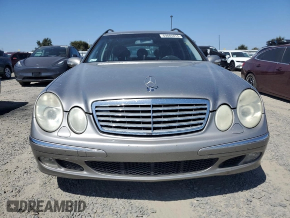 2005 Mercedes-Benz E 500 with VIN WDBUH83J35X168838, listed as a Copart auction lot 69885014 with 203,187 mi miles and Salvage Title. Bid and sale history available at carsss.com. Image 5.
