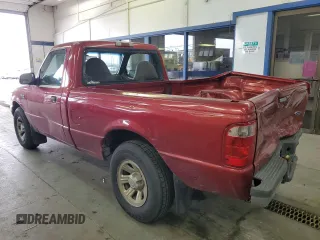2001 Ford Ranger XL with VIN 1FTYR10C61TA40124, listed as a Copart auction lot 48943325 with 196,810 mi miles and Salvage title. Bid and sale history available at DreamBid. Image 2.