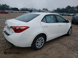 2019 Toyota Corolla L with VIN 5YFBURHE8KP877250, listed as a Copart auction lot 46401935 with 123,783 mi miles and Salvage Title. Bid and sale history available at DreamBid. Image 3.