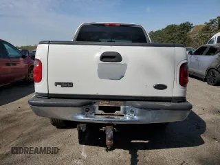 2002 Ford F-150 XLT with VIN 1FTRW07L32KE29159, listed as a Copart auction lot 50596125 with 198,058 mi miles and Salvage Title. Bid and sale history available at carsss.com. Image 6.