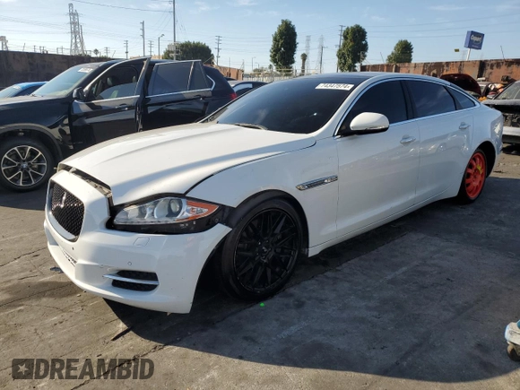 2014 Jaguar XJ with VIN SAJWA2GZ9E8V71794, listed as a Copart auction lot 74347574 with 106,172 mi miles and Clean Title. Bid and sale history available at carsss.com. Image 1.
