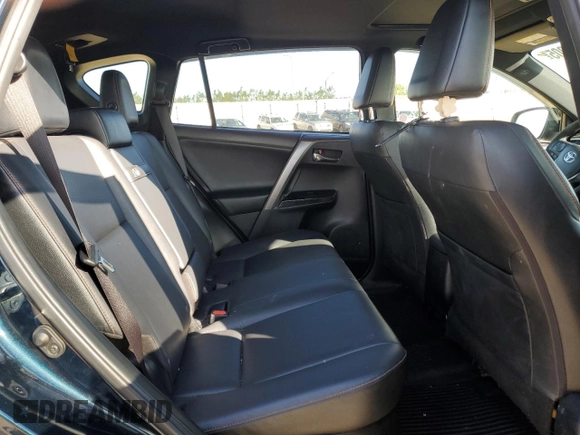 2018 Toyota RAV4 Hybrid SE with VIN JTMJJREV2JD230126, listed as a Copart auction lot 62574005 with 196,846 mi miles and Salvage title. Bid and sale history available at DreamBid. Image 11.
