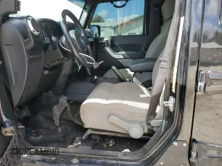 2014 Jeep Wrangler Unlimited Rubicon X с VIN 1C4HJWFG0EL142071, выставлен на аукционе Copart как лот 72898994 с пробегом 110 597 миль миль и Списание • Salvage title. История ставок и продаж доступна на DreamBid. Изображение 7.