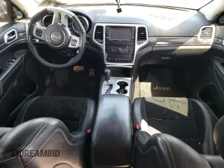 2012 Jeep Grand Cherokee SRT8 with VIN 1C4RJFDJ2CC352056, listed as a Copart auction lot 48810994 with 114,807 mi miles and Salvage Title. Bid and sale history available at carsss.com. Image 8.