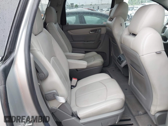 2016 Chevrolet Traverse LT z VIN 1GNKRHKDXGJ115343, wystawiony jako IAAI lot #42246084 z przebiegiem 148 021 mil mil oraz . Historia ofert i sprzedaży dostępna na DreamBid. Obrazek 8.
