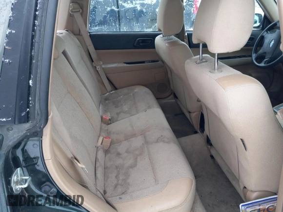 2003 Subaru Forester X with VIN JF1SG63643H749712, listed as a Copart auction lot 77907234 with 166,974 mi miles and Salvage Title. Bid and sale history available at carsss.com. Image 10.
