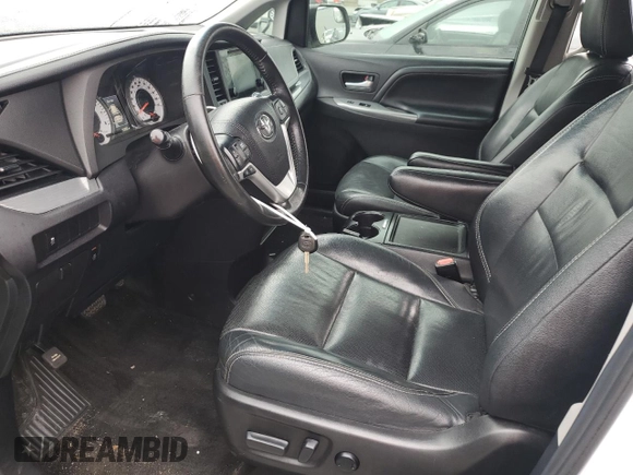 2015 Toyota Sienna SE with VIN 5TDXK3DCXFS670630, listed as a Copart auction lot 51305415 with 142,892 mi miles and Salvage Title. Bid and sale history available at carsss.com. Image 7.