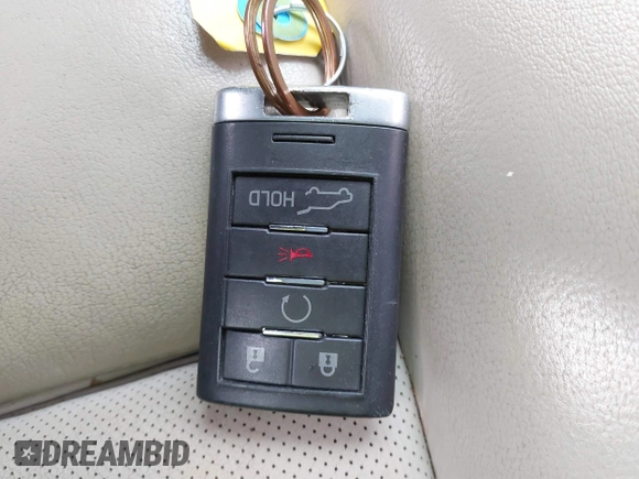 2014 Cadillac SRX Premium Collection z VIN 3GYFNDE34ES548826, wystawiony jako IAAI lot #40792942 z przebiegiem 115 984 mil mil oraz . Historia ofert i sprzedaży dostępna na DreamBid. Obrazek 11.