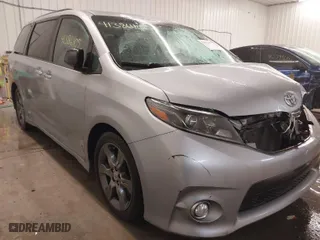 2015 Toyota Sienna SE with VIN 5TDXK3DC2FS670993, listed as a IAAI auction lot 41386405 with 166,906 mi miles. Bid and sale history available at carsss.com. Image 1.