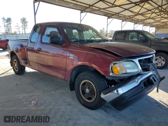 2003 Ford F-150 XL with VIN 1FTRX07L33KB73992, listed as a Copart auction lot 79565774 with 160,545 mi miles and Salvage title. Bid and sale history available at DreamBid. Image 4.